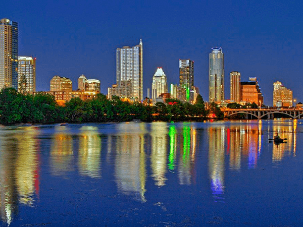 Austin skyline from the shores of Lady Bird Lake at twilight